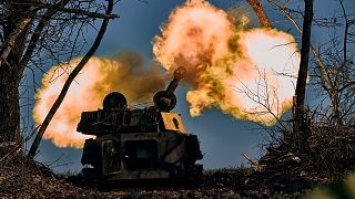 A self-propelled artillery vehicle fires near Bakhmut, Donetsk region, Ukraine, Wednesday, Nov. 9, 2022.