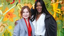 Actor Isabelle Huppert and model Naomi Campbell at the inauguration of the Christmas windows of the Pintemps-Hausmann in Paris.