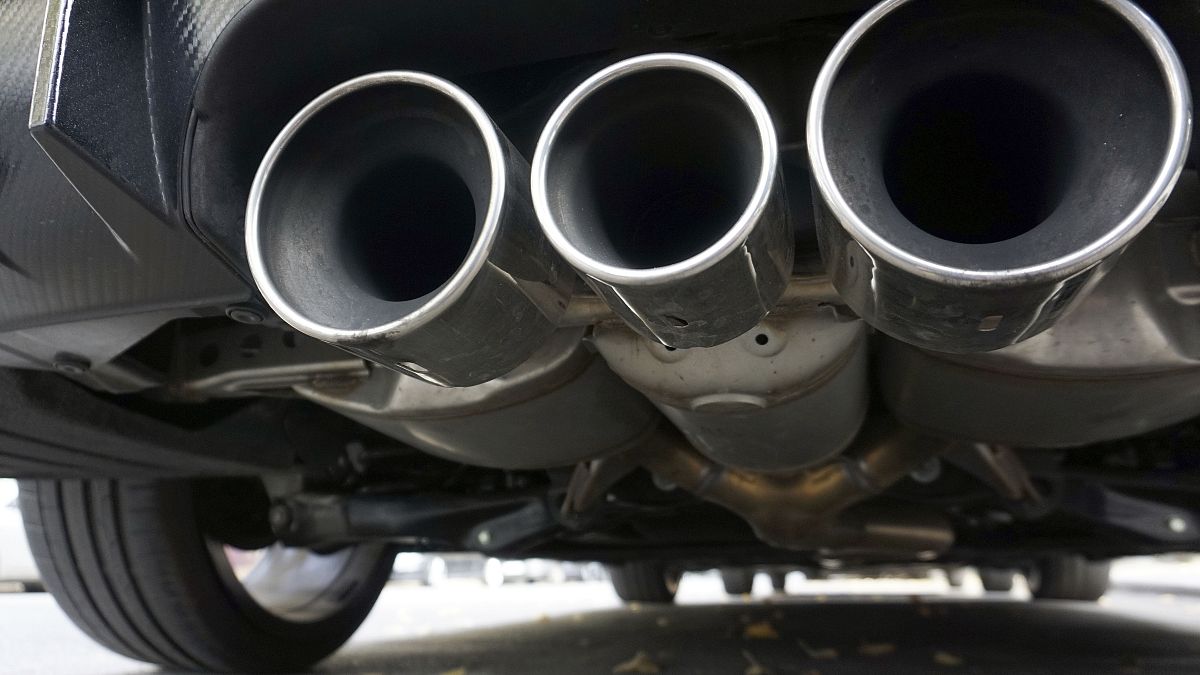Exhaust pipes of a car are pictured in Berlin, Germany, Tuesday, Oct. 9, 2018. 