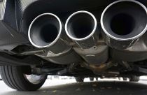 Exhaust pipes of a car are pictured in Berlin, Germany, Tuesday, Oct. 9, 2018. 