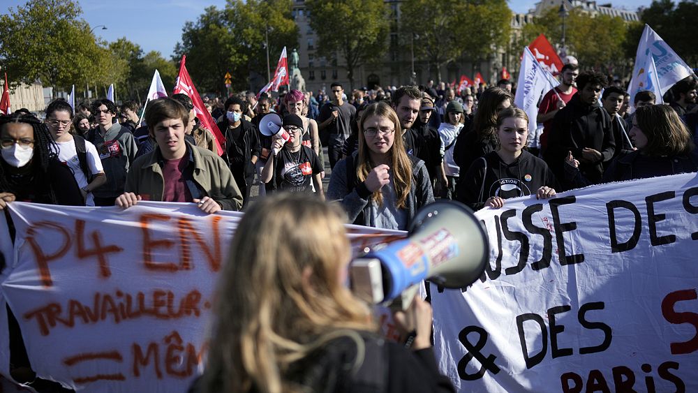 Thousands march across France in protest over rising cost of living