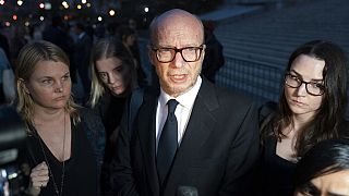 Film director Paul Haggis leaves court after losing sexual assault civil lawsuit