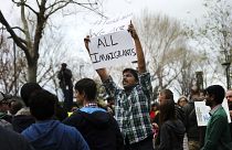 موثومالا دانداباني، مهاجر هندي خلال مسيرة احتجاج امام البيت الأبيض، واشنطن.