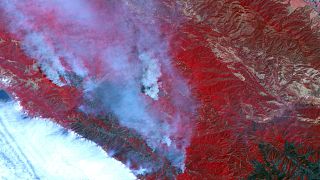 This false-colour satellite image of the Santa Lucia Range Mountains near Big Sur, California shows smoke vegetation and burned ground from a wildfire.