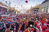 Carnival revellers celebrate at 11:11 with tens of thousands the start of the carnival season in the streets of Cologne, Germany,