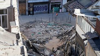 French police blocks access to the site of a collapsed building in the city of Lille, northern France, on November 12, 2022