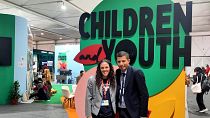 Hailey Campbell (left) and Mohab Sherif at the Children and Youth Pavilion.