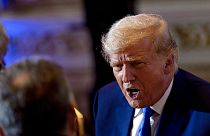 Former President Donald Trump speaks to guests at Mar-a-lago on Nov. 8, 2022, in Palm Beach, Fla.