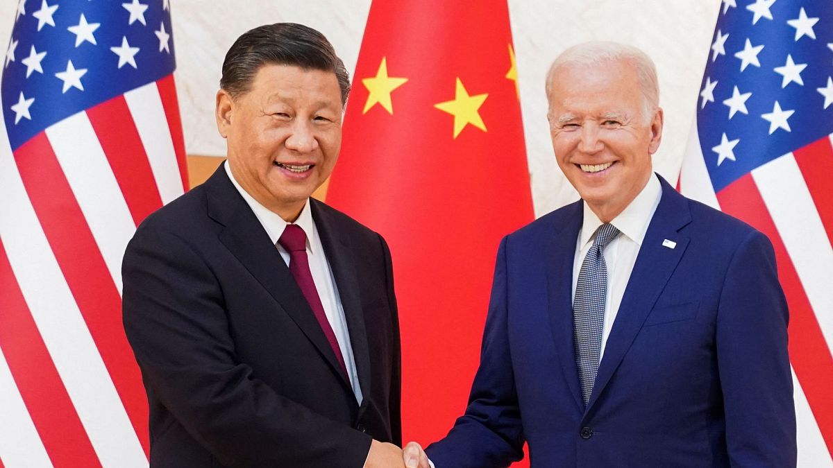 U.S. President Joe Biden shakes hands with Chinese President Xi Jinping as they meet on the sidelines of the G20 leaders' summit in Bali, Indonesia, November 14, 2022. REUTERS