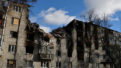 A view of an apartment building damaged by shelling in Sviatohirsk, Ukraine.