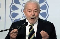 Brazilian President-elect Luiz Inacio Lula da Silva gestures while he speaks at COP27.