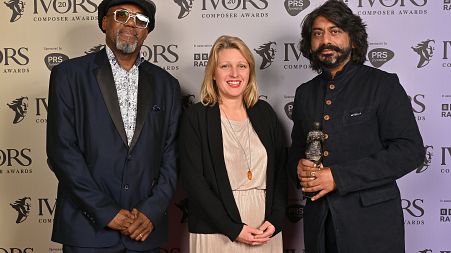Talvin Singh accepts the Ivor Novello Award for Innovation (in association with the MU) from Orphy Robinson and Naomi Pohl