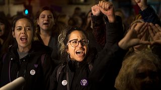 Women shout outside the Justice Ministry in Madrid, Spain, Monday, Nov. 4, 2019.