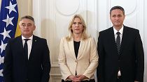 Members of Bosnia's newly elected tripartite presidency pose for a photo during the presidency inauguration ceremony in Sarajevo, 16 November 2022