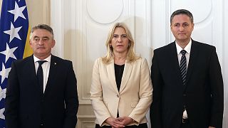Members of Bosnia's newly elected tripartite presidency pose for a photo during the presidency inauguration ceremony in Sarajevo, 16 November 2022