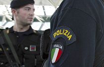 Italian police at an airport in Rome.