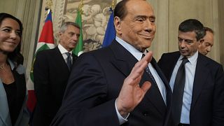 Silvio Berlusconi waves as he leaves the Quirinal Palace. 21 October 2022.