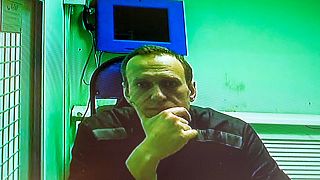 Alexei Navalny is seen in a video link provided by the Russian Federal Penitentiary Service in a courtroom  in Moscow, Russia, Tuesday, Oct. 18, 2022.