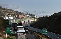 Lorries queue to embark on a ferry at the entrance of the Port of Dover, southeast England, on February 16, 2022. Britain's trade with the EU has been dented by Brexit.