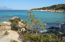 You don't have to go Greek's islands to find stunning beaches in Greece. Here, Kavourotrypes Beach in the Sithonia peninsula in Halkidiki.