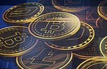 An advertisement of Bitcoin, one of the cryptocurrencies, is displayed on a building in Hong Kong, on 18 November 2021.