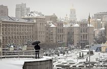 A man looks at the Maidan Independence Square in Kyiv, 21 November 2022
