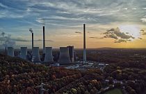 The sun sets behind the cole-fired power plant 'Scholven' of the Uniper energy company in Gelsenkirchen, Germany, Oct. 22, 2022. 