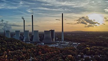 The sun sets behind the cole-fired power plant 'Scholven' of the Uniper energy company in Gelsenkirchen, Germany, Oct. 22, 2022. 