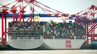 The 'OOCL United Kingdom' container vessel is anchored at the 'Jade Weserport' container terminal in Wilhelmshaven, Germany