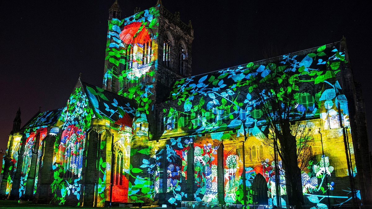 Paisley Abbey lit up for an installation called 'About Us', created by 59 Productions, as part of the UNBOXED: Creativity in the UK event, in Paisley, Scotland, Feb. 28, 2022.