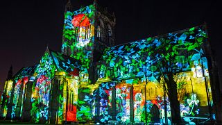 Paisley Abbey lit up for an installation called 'About Us', created by 59 Productions, as part of the UNBOXED: Creativity in the UK event, in Paisley, Scotland, Feb. 28, 2022.