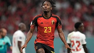 Belgium's Michy Batshuayi celebrates after scoring his side's opening goal during the World Cup group F soccer match between Belgium and Canada