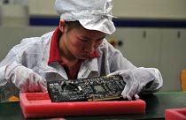 Une employée dans l'une des usines de fabrication d'Iphone de Foxconn - 26.05.2010