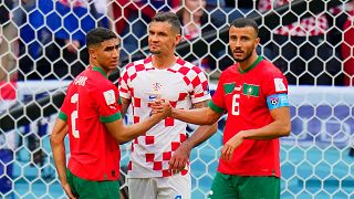 Morocco secure draw in World Cup opener