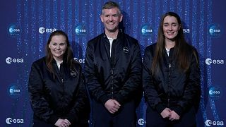 ESA's new astronauts Meganne Christian, left, John McFall, centre, and Rosemary Coogan, right, during the ESA Council at Ministerial level (CM22) in Paris, Nov. 23, 2022.