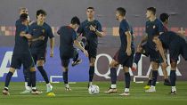 Portugal's Cristiano Ronaldo warms up with his teammates during the Portugal's official training on the eve of the group H World Cup soccer match