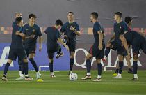 Portugal's Cristiano Ronaldo warms up with his teammates during the Portugal's official training on the eve of the group H World Cup soccer match