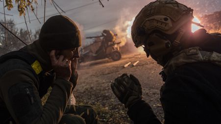 Ukrainian servicemen fire towards Russian positions in the frontline near Kherson, southern Ukraine, Wednesday, Nov. 23, 2022.