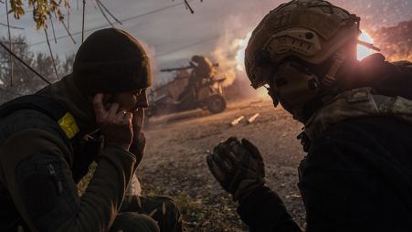 Ukrainian servicemen fire towards Russian positions in the frontline near Kherson, southern Ukraine, Wednesday, Nov. 23, 2022. 