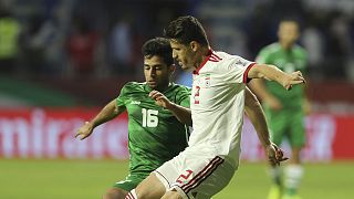 Voria Ghafouri, then an Iranian national team player, right, during the AFC Asian Cup match in Dubai in January 2019
