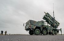 "Patriot" anti-aircraft missile systems of the German Bundeswehr stand on the airfield of military airport during a media presentation in Schwesing, 17 March 2022