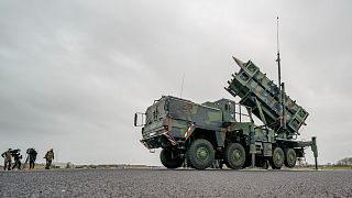 "Patriot" anti-aircraft missile systems of the German Bundeswehr stand on the airfield of military airport during a media presentation in Schwesing, 17 March 2022