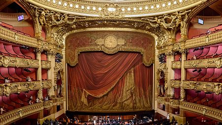 The interior of a grand opera house
