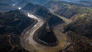 A view of Ter river running dry toward a reservoir near Vilanova de Sau, Catalonia, Spain, Wednesday, Nov. 23, 2022. 