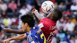 Japan's Miki Yamane, left, and Costa Rica's Joel Campbell, right, challenge for the ball during the World Cup, group E match in Al Rayyan , Qatar, Sunday, Nov. 27, 2022.