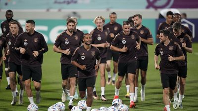 Germany's Serge Gnabry, centre, leads the field during a training session at the Al-Shamal stadium on the eve of the match against Spain in Al-Ruwais, Qatar, Nov. 25, 2022.