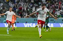 Poland's Robert Lewandowski celebrates scoring his side's 2nd goal during the World Cup group C match against Saudi Arabia in Al Rayyan , Qatar, Saturday, Nov. 26, 2022.