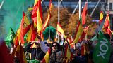 Supporters of far-right party Vox wave Spain's national flags 