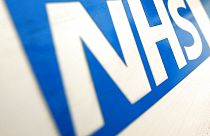 The logo of the NHS, the UK's public health care provider.