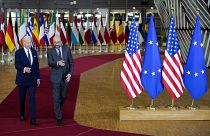 President Joe Biden walks with European Council President Charles Michel during an EU summit at the European Council building in Brussels, Thursday, March 24, 2022.